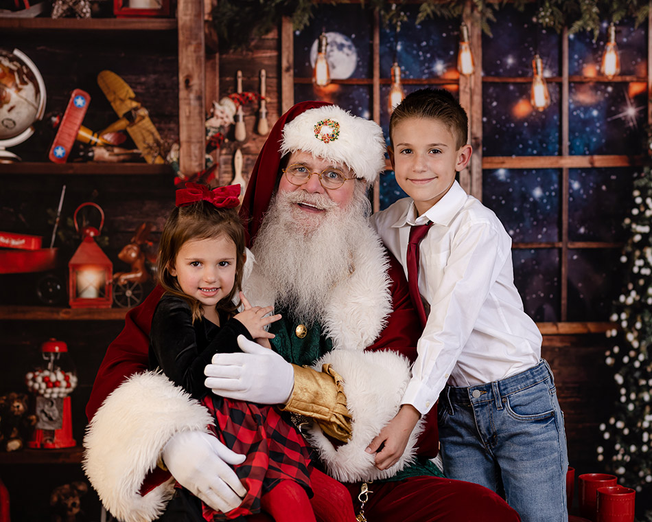 children sitting with santa